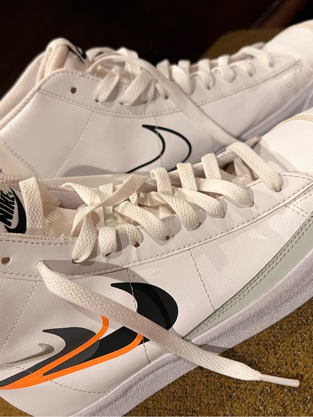 Nike Men White Sneakers with Black and Orange Accent